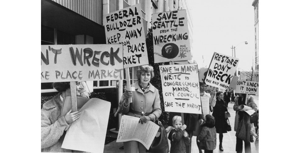 Sign-carrying members of the Friends of the Market picketed City Hall in February 1971 to protest the proposed Pike Plaza urban-renewal project for Pike Place Market. (Richard S. Heyza / The Seattle Times, 1971)